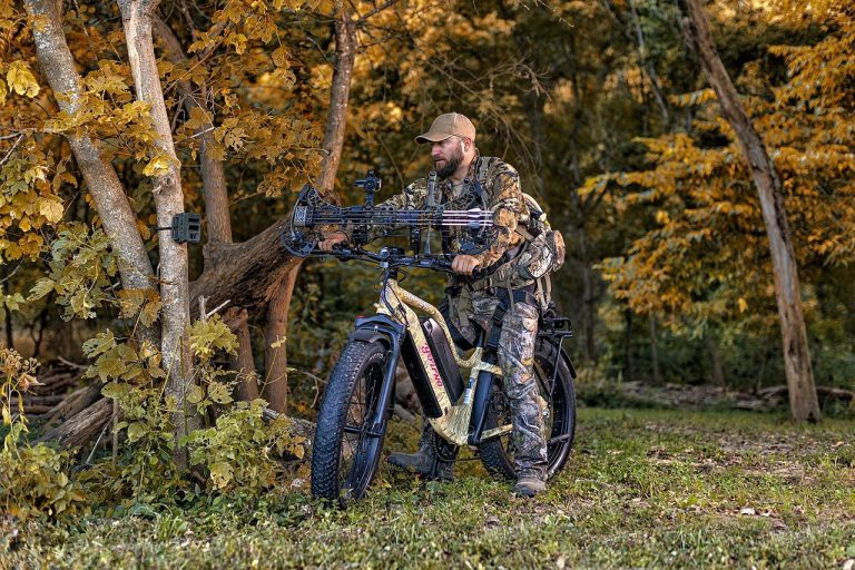 Man Riding an Electric Hunting Bike in the Forest
