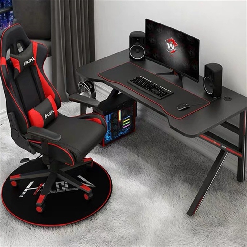 A gaming chair right side front a table